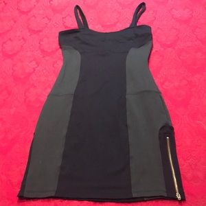 Sleeveless little black two-tone black with zipper accent dress